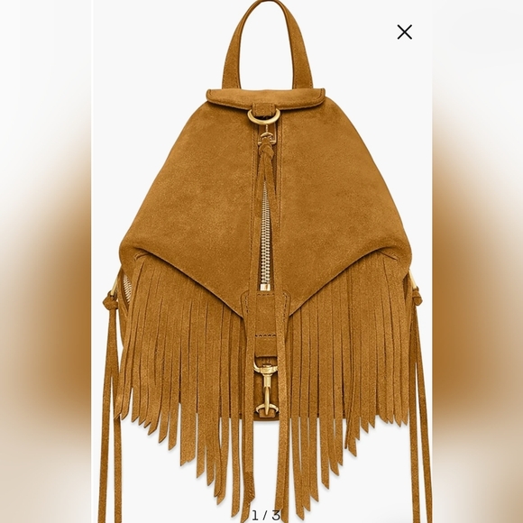 designer black mini backpack Madpax Got Your Designed in a compact car key holder Hermès 2024 Mini Swift Color:GEO CAMOUFLAGE